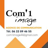 Logo de Com'1 image